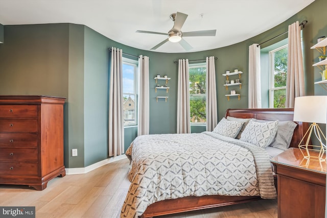3240 Hiatt Pl NW Unit 4, Washington, DC 20010 - bedroom with light wood finished floors and ceiling fan