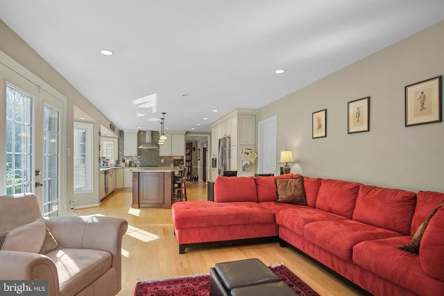 11603 Auburn Grove Ct, Reston, VA 20194 - living room with light wood-style floors, recessed lighting, and french doors