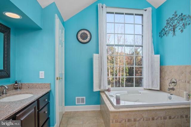 11603 Auburn Grove Ct, Reston, VA 20194 - bathroom with vaulted ceiling, vanity, a bath, and tile patterned floors