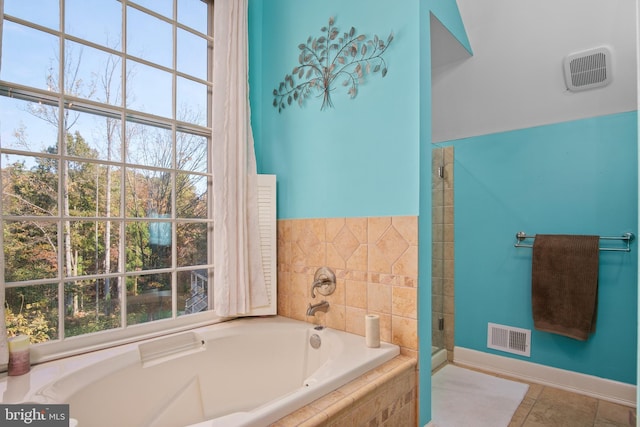 11603 Auburn Grove Ct, Reston, VA 20194 - bathroom featuring a bath, healthy amount of natural light, and a stall shower