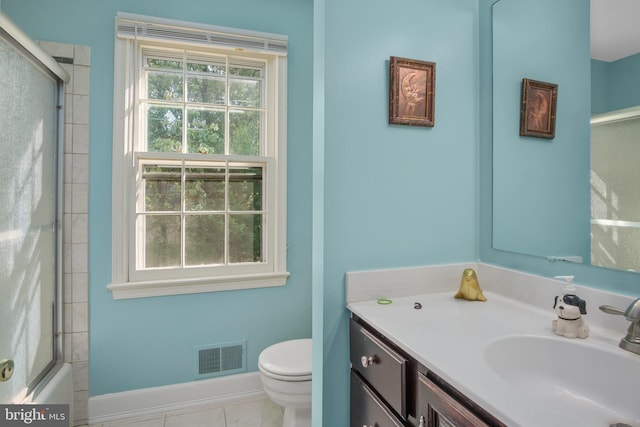 11603 Auburn Grove Ct, Reston, VA 20194 - bathroom featuring vanity, shower / bath combination with glass door, and tile patterned flooring