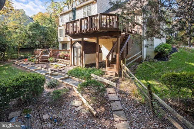 11603 Auburn Grove Ct, Reston, VA 20194 - back of property featuring a wooden deck, stairway, and a garden