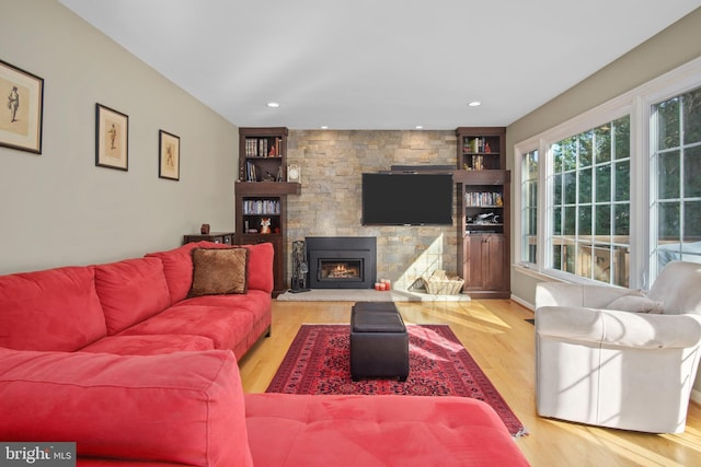 11603 Auburn Grove Ct, Reston, VA 20194 - living area with wood finished floors, a fireplace, recessed lighting, and built in features