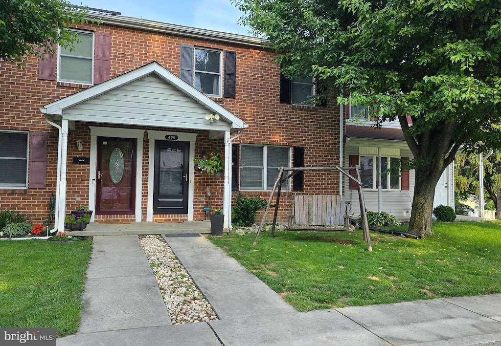 404 N Walnut St, Mount Holly Springs, PA 17065 - multi unit property with brick siding and a front lawn