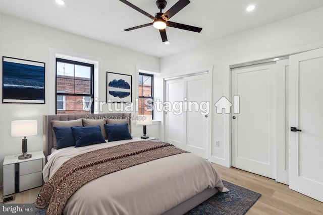 2012 S Mildred St, Philadelphia, PA 19148 - bedroom featuring two closets, light wood finished floors, recessed lighting, and a ceiling fan