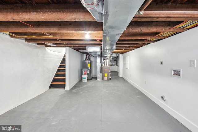 2012 S Mildred St, Philadelphia, PA 19148 - unfinished below grade area with water heater, stairs, and heating unit