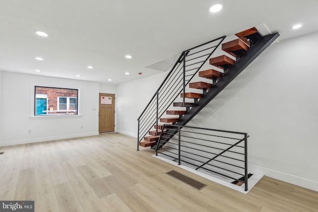 2012 S Mildred St, Philadelphia, PA 19148 - entrance foyer with wood finished floors, recessed lighting, and stairway