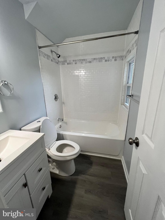 1107 N Fulton Ave, Baltimore, MD 21217 - full bath featuring vanity,  shower combination, and wood finished floors