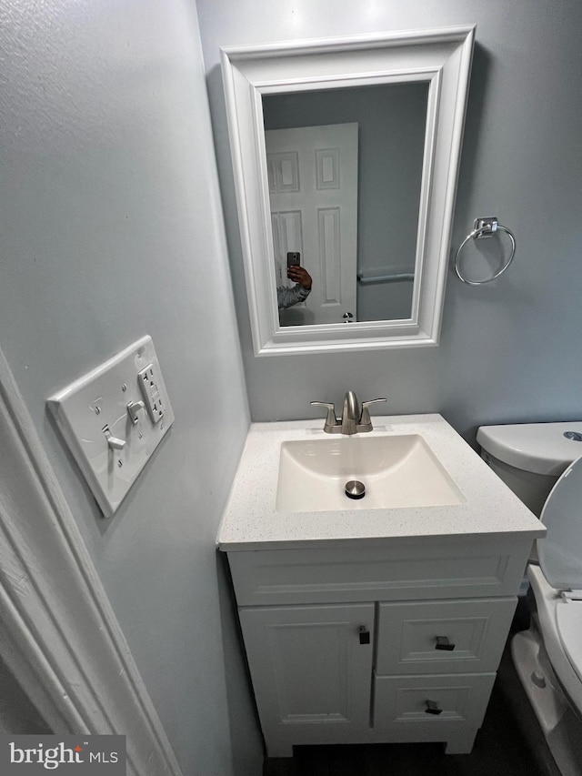 1107 N Fulton Ave, Baltimore, MD 21217 - half bathroom with toilet and vanity