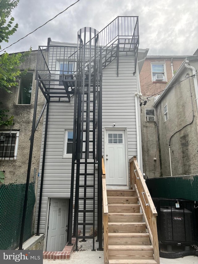 1107 N Fulton Ave, Baltimore, MD 21217 - rear view of house featuring entry steps