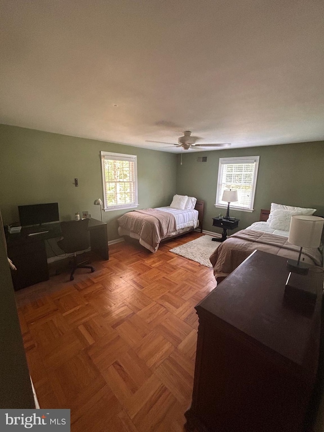 223 Country Gate Rd, Wayne, PA 19087 - bedroom with multiple windows, an office area, and ceiling fan
