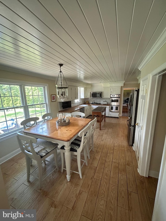 223 Country Gate Rd, Wayne, PA 19087 - dining room with hardwood / wood-style floors and crown molding