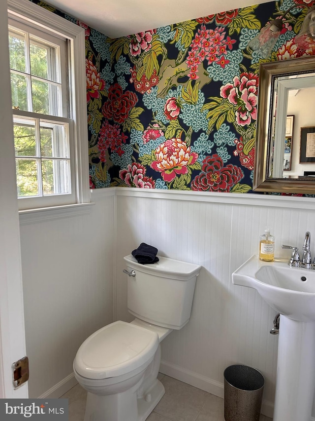 223 Country Gate Rd, Wayne, PA 19087 - bathroom with a wainscoted wall, healthy amount of natural light, tile patterned flooring, and wallpapered walls