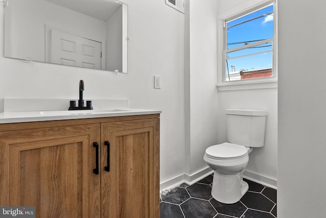 3216 N Randolph St, Philadelphia, PA 19140 - half bath with vanity and tile patterned floors