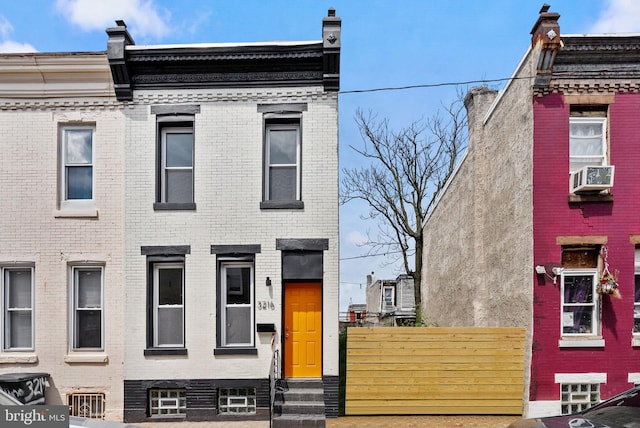 3216 N Randolph St, Philadelphia, PA 19140 - view of property featuring entry steps, brick siding, and cooling unit