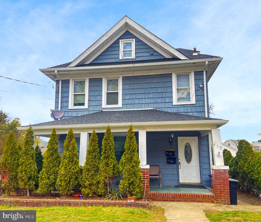 479 Hampton Ave, Long Branch, NJ 07740 - american foursquare style home featuring covered porch and a shingled roof
