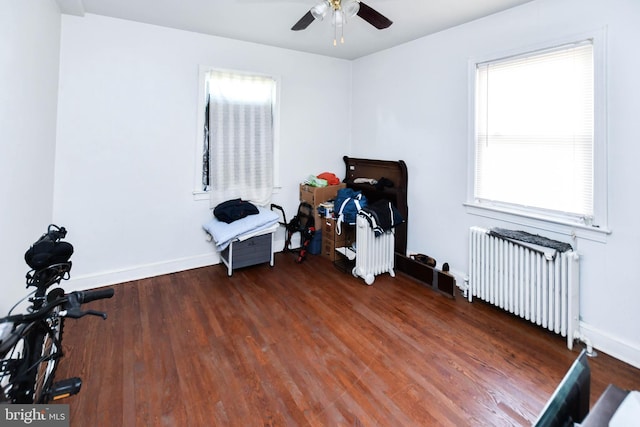 455 Lebaum St SE, Washington, DC 20032 - misc room with radiator heating unit, a ceiling fan, and wood finished floors