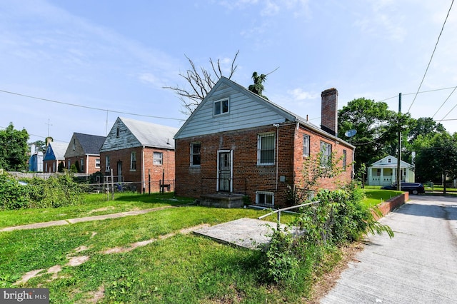 455 Lebaum St SE, Washington, DC 20032 - rear view of house with brick siding and a chimney