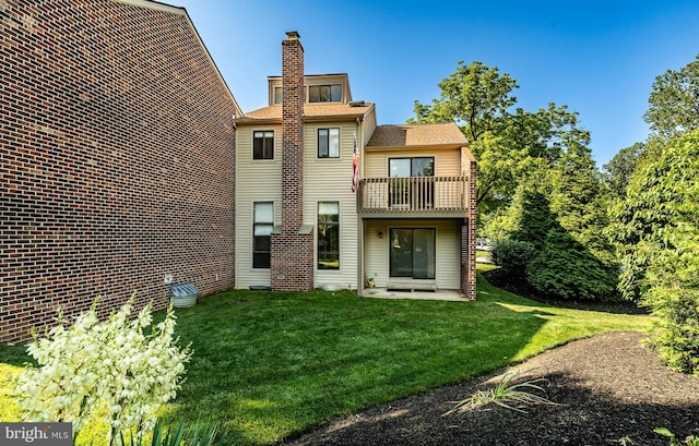 30 Scott Ct, Chesterbrook, PA 19087 - back of house featuring a balcony and a lawn