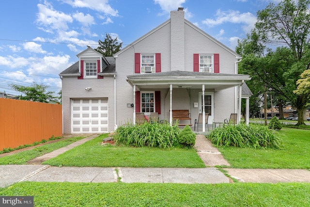 2941 N 6th St, Harrisburg, PA 17110 - traditional home featuring a porch, a garage, a chimney, driveway, and brick siding