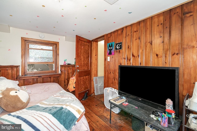 2941 N 6th St, Harrisburg, PA 17110 - bedroom featuring wood walls and wood-type flooring