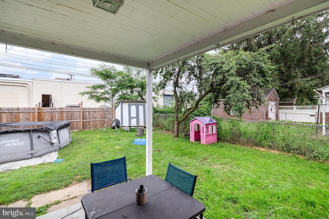 2941 N 6th St, Harrisburg, PA 17110 - fenced backyard with a storage shed and outdoor dining area