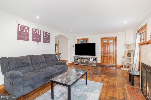 2941 N 6th St, Harrisburg, PA 17110 - living area featuring arched walkways, dark wood-style flooring, and recessed lighting
