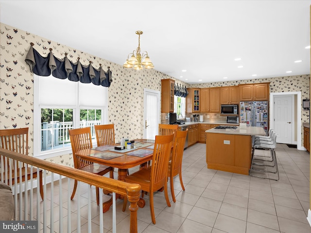 1509 Winfields Ln, Gambrills, MD 21054 - dining room with wallpapered walls, a chandelier, light tile patterned floors, and recessed lighting
