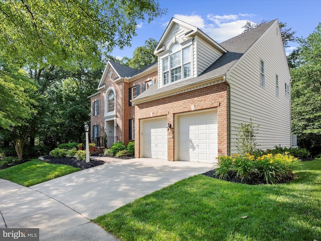 1509 Winfields Ln, Gambrills, MD 21054 - view of front facade with a garage, brick siding, driveway, a front yard, and a shingled roof