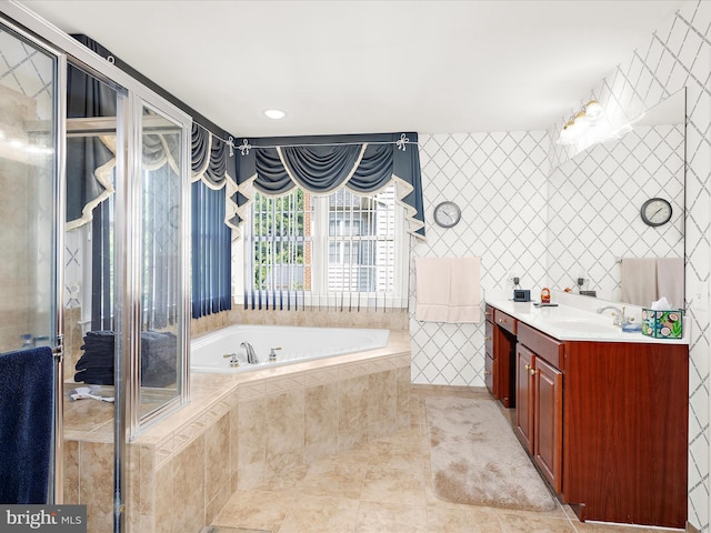 1509 Winfields Ln, Gambrills, MD 21054 - full bathroom with vanity, a garden tub, tile patterned flooring, and tile walls