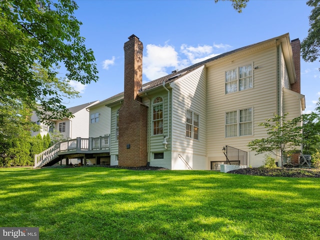 1509 Winfields Ln, Gambrills, MD 21054 - back of house with a chimney, a yard, and stairway