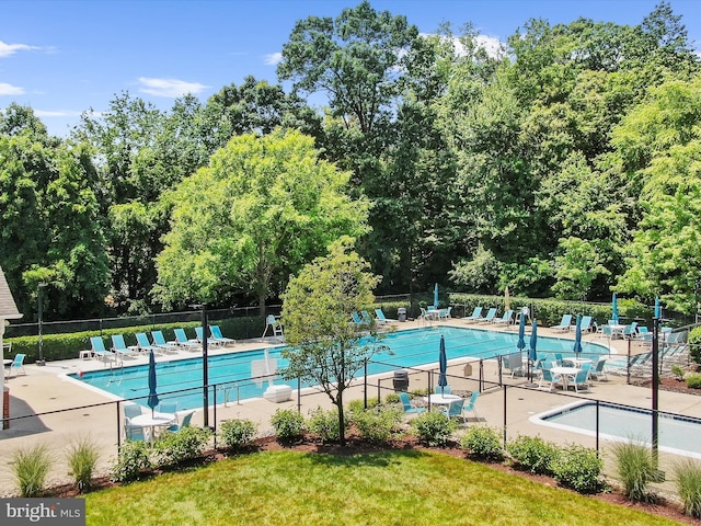 1509 Winfields Ln, Gambrills, MD 21054 - community pool with a patio and view of scattered trees