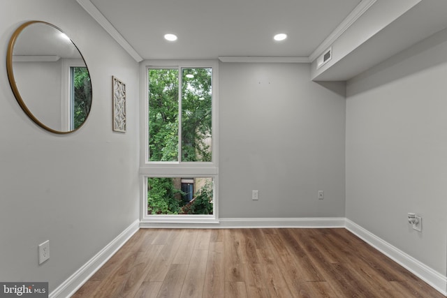 8677 Greenbelt Rd Unit 201, Greenbelt, MD 20770 - unfurnished room with crown molding, wood finished floors, and recessed lighting