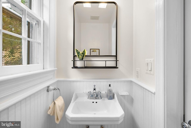 411 Windsor St, Silver Spring, MD 20910 - bathroom with a wainscoted wall and plenty of natural light