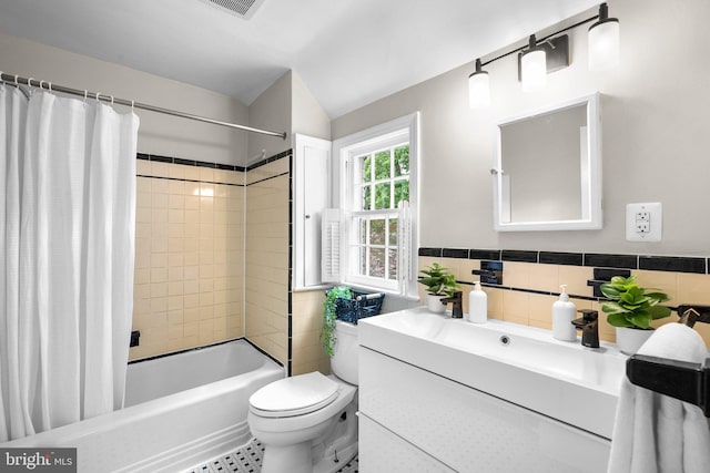 411 Windsor St, Silver Spring, MD 20910 - bathroom featuring vanity, shower / bathtub combination with curtain, and tile walls