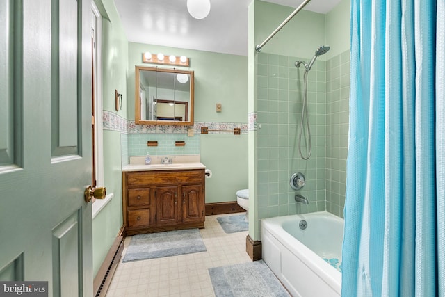1445 Farmington Ave, Pottstown, PA 19464 - full bathroom featuring tile patterned floors, vanity, shower / bath combo, and a wainscoted wall