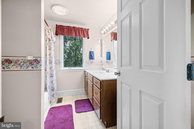 1445 Farmington Ave, Pottstown, PA 19464 - full bath featuring vanity, tile patterned floors, and shower / bath combo