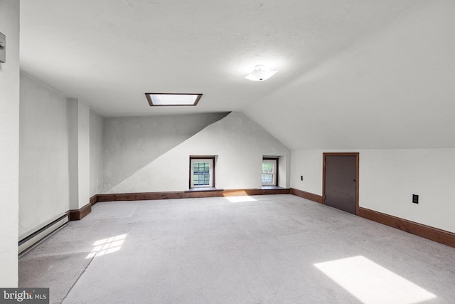 1445 Farmington Ave, Pottstown, PA 19464 - bonus room featuring a baseboard radiator, carpet, and vaulted ceiling
