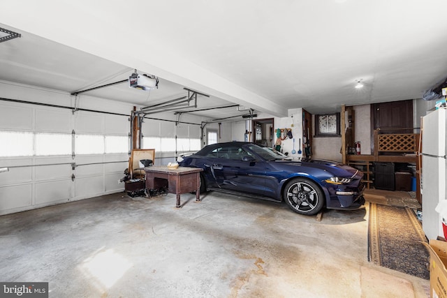 1445 Farmington Ave, Pottstown, PA 19464 - garage featuring a garage door opener