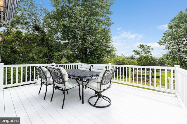 1445 Farmington Ave, Pottstown, PA 19464 - wooden terrace featuring outdoor dining space and view of scattered trees