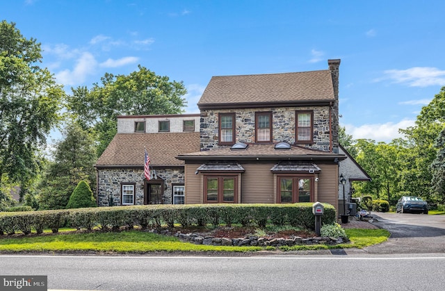 1445 Farmington Ave, Pottstown, PA 19464 - view of front of house featuring stone siding, a chimney, and a shingled roof