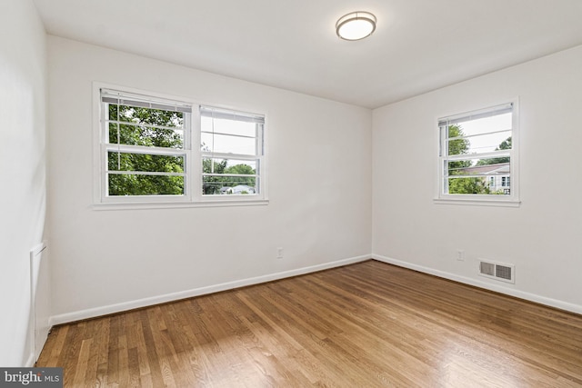 7119 Sea Cliff Rd, Mclean, VA 22101 - spare room with wood finished floors and baseboards