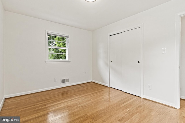 7119 Sea Cliff Rd, Mclean, VA 22101 - unfurnished bedroom featuring light wood-type flooring and a closet