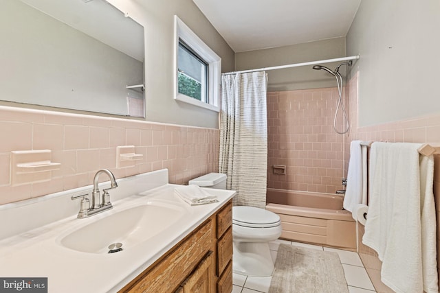 7119 Sea Cliff Rd, Mclean, VA 22101 - bathroom with tile walls, vanity, tile patterned flooring, shower / bath combination with curtain, and wainscoting
