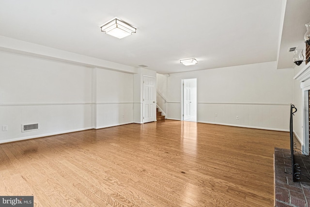 7119 Sea Cliff Rd, Mclean, VA 22101 - unfurnished living room with wood finished floors and stairs
