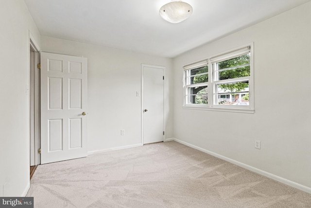 7119 Sea Cliff Rd, Mclean, VA 22101 - unfurnished bedroom featuring light carpet and baseboards