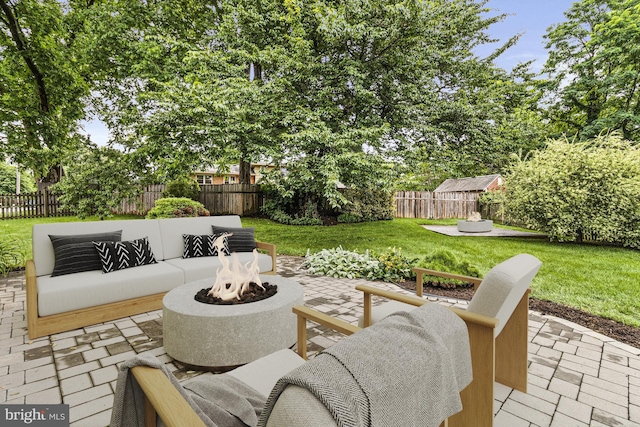 7119 Sea Cliff Rd, Mclean, VA 22101 - fenced backyard with a patio and an outdoor living space with a fire pit
