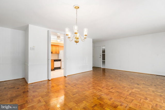 7 Stonehenge Unit 7-5, Pikesville, MD 21208 - empty room featuring a chandelier and baseboards