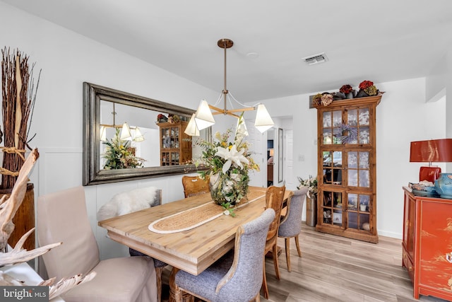 19 Warwick Way, Southampton, NJ 08088 - dining room with light wood finished floors and a chandelier