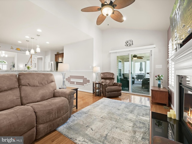 5910 Constance Way, New Market, MD 21774 - living area with a ceiling fan, recessed lighting, a fireplace with flush hearth, lofted ceiling, and light wood-style floors
